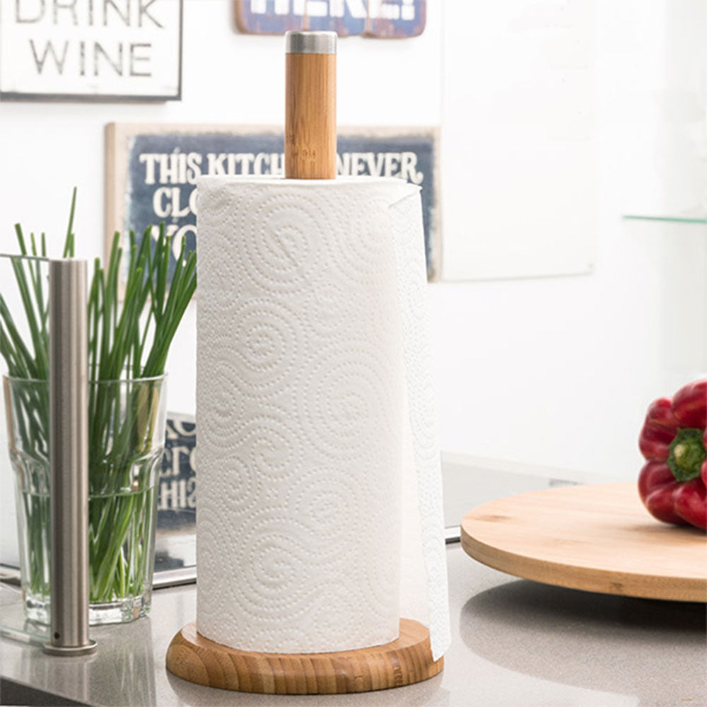 Eco-Friendly Bamboo Kitchen Roll Holder 32cm from Europe. The base stops your kitchen roll from unwinding. This stand is perfect for holding your rolls in the kitchen. 32cm tall so it will fit all generic kitchen rolls. Ideal for home kitchen, restaurants and bars. Bags Direct wholesale online shop 784200490