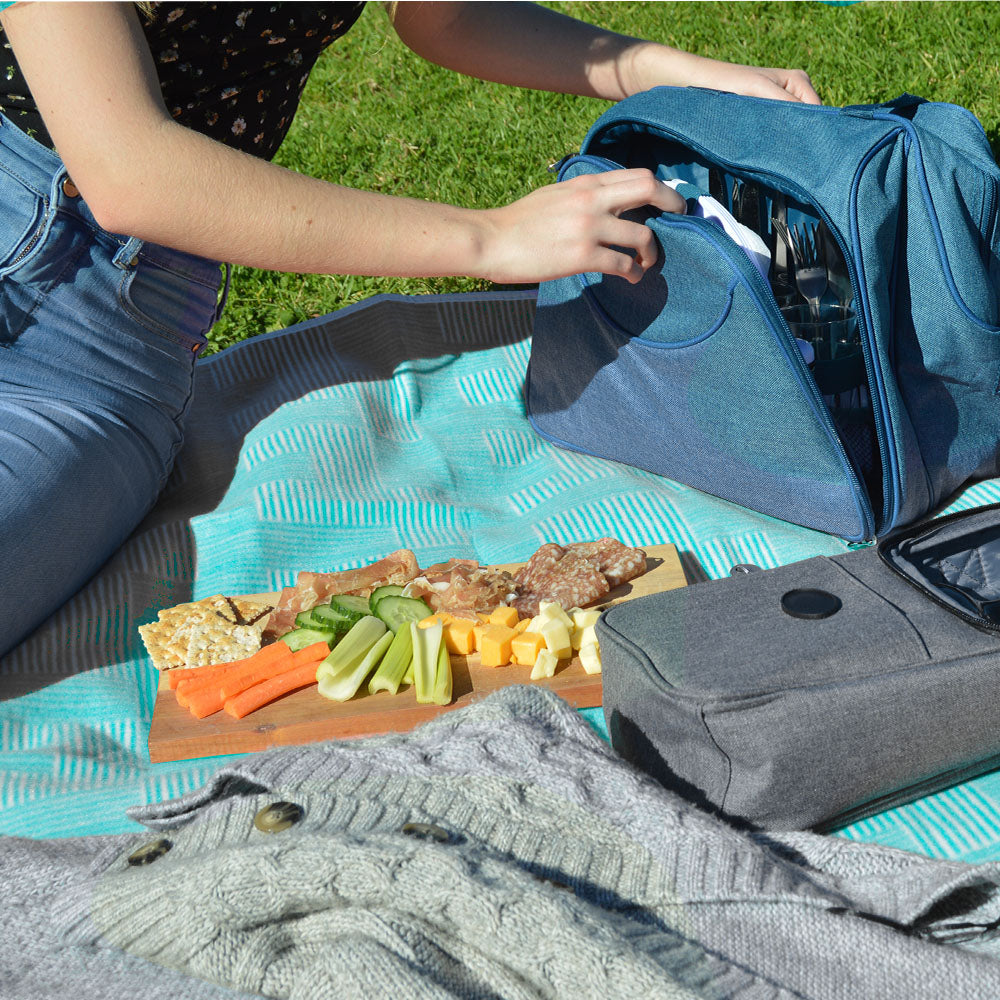 Foldable waterproof lining picnic blanket with handle can fit up to 4 people. This picnic blanket is designed with an underneath water-resistant layer. It folds into a small compact bag that has a handle which makes carrying easier. The picnic blanket is made of fleece which will keep you dry and warm. Size 130 x 150cm. Bags Direct wholesale online shop C34100070